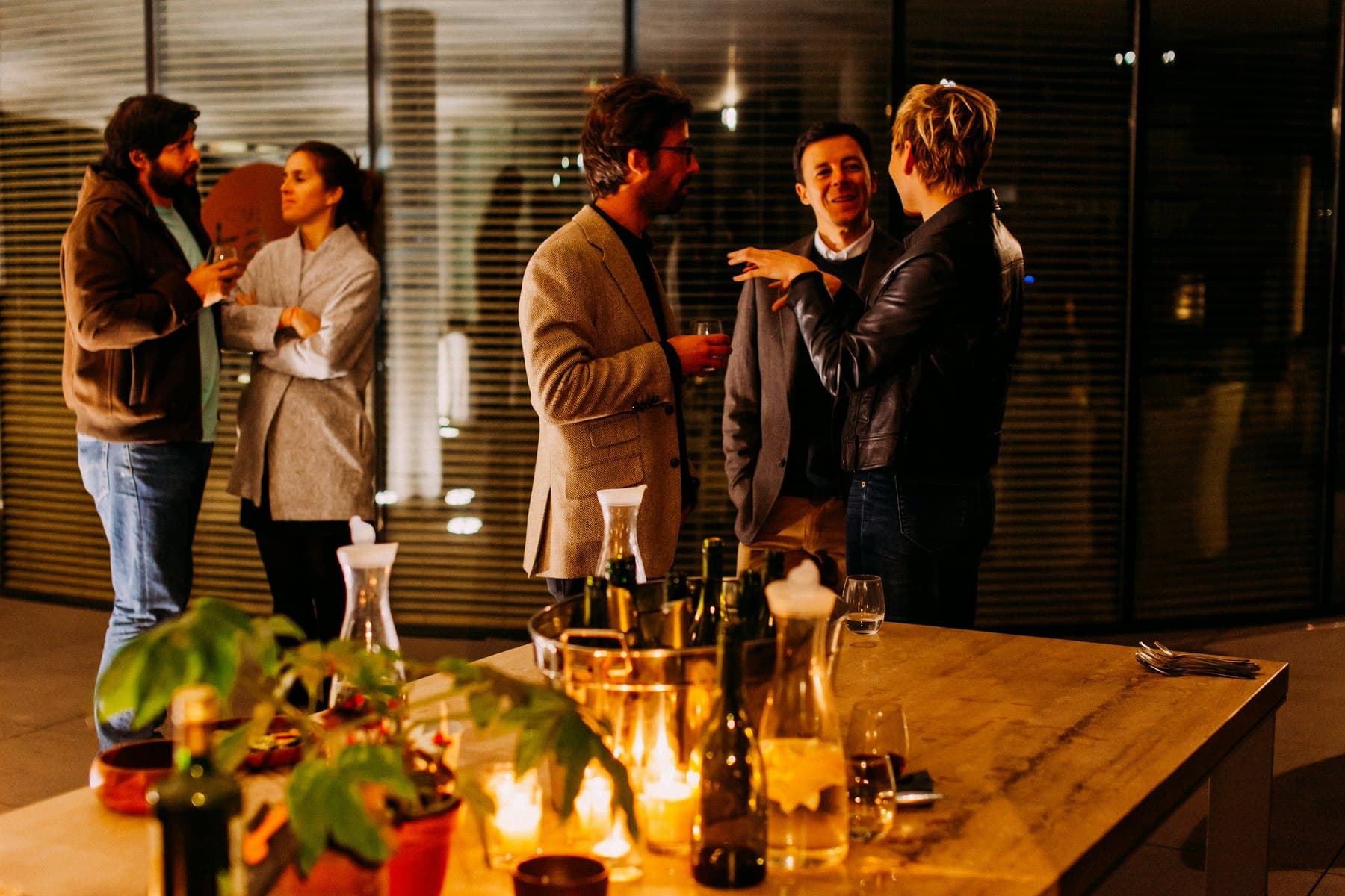 Guests in conversation at a corporate drinks reception